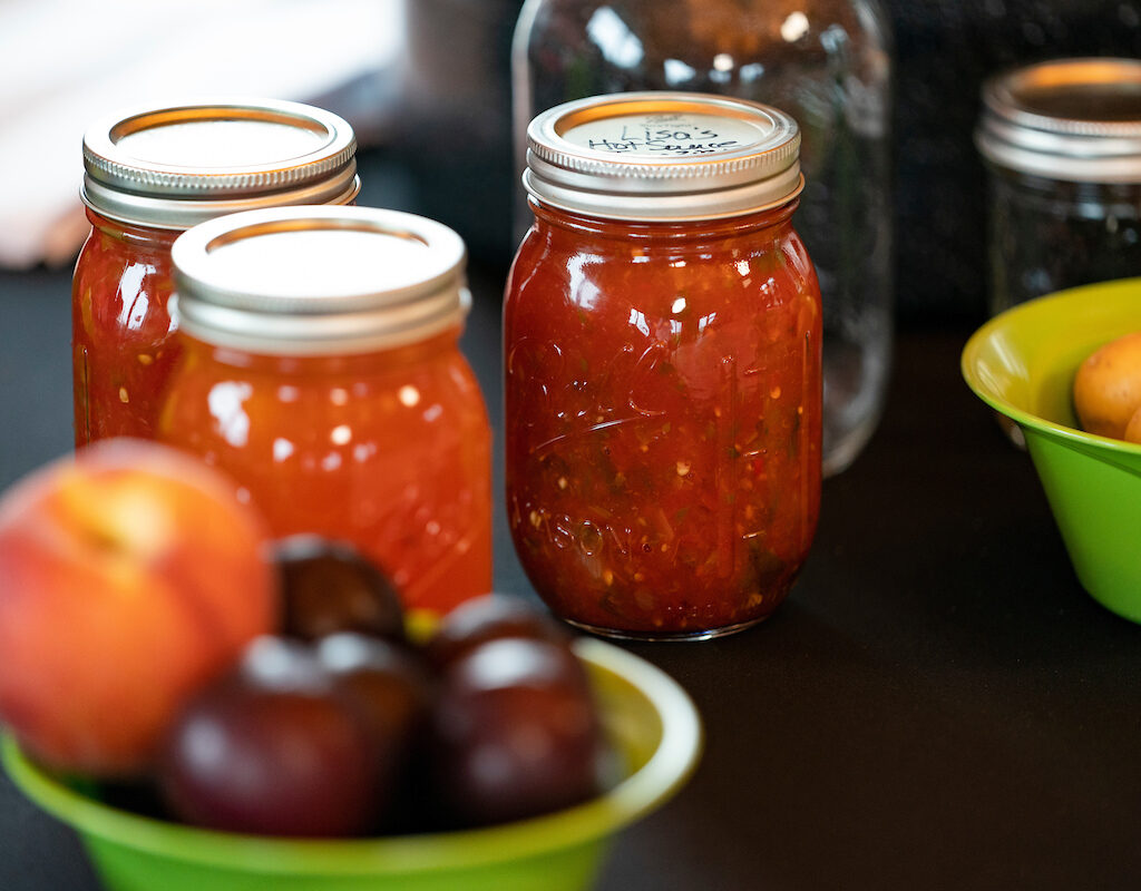 Jars of red hot sauce