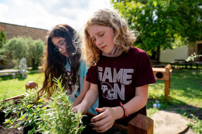 girls tending a school garden