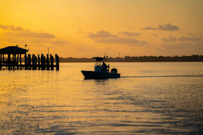 Boat on the water at sunset