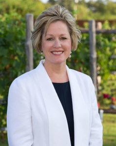 Dr. Courtney Dodd in The Gardens at Texas A&M University.